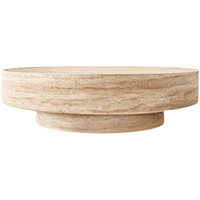 Table basse ronde en travertin sculpté Vitolo, mobilier en pierre moderne de luxe pour le salon