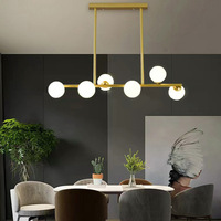 Luminaires d'îlot de lustre en or moderne, globes linéaires en verre de lait à 6 lumières pour îlot de cuisine