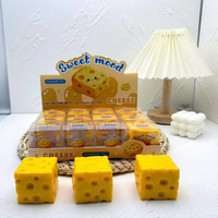 Vente en gros usine : Jouet sensoriel anti-stress à presser, en forme de boule de pudding au caramel et de bloc de construction, avec son croquant et simulation de boulette de maïs, sensation de chaleur