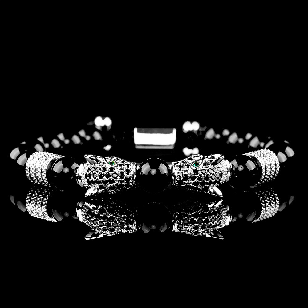 Testa di leopardo in platino con diamanti neri