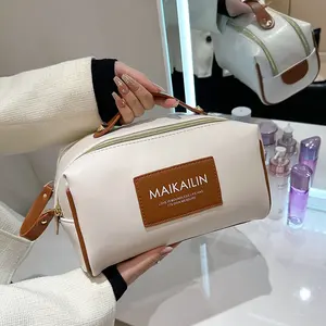 The New Cosmetic Bag High-end Women's Toilet Hand In Hand Large-capacity Travel Storage Skin Care Products Toiletry Bag