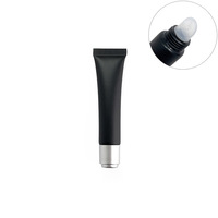 Tube de crème en plastique noir givré avec tube de crème pour les yeux à rouleau avec bouchon en métal argenté Logo personnalisé en or Conteneurs de brillant à lèvres vides