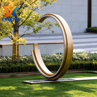 Sculpture d'anneau en acier inoxydable peinte sur mesure, style moderne, pour l'aménagement paysager et la décoration artistique en métal pour l'immobilier