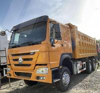 En stock Sinotruck Howo 6x4 10 roues Diesel Camion lourd 40 mètres cubes Direction à gauche Nouveau Camion benne