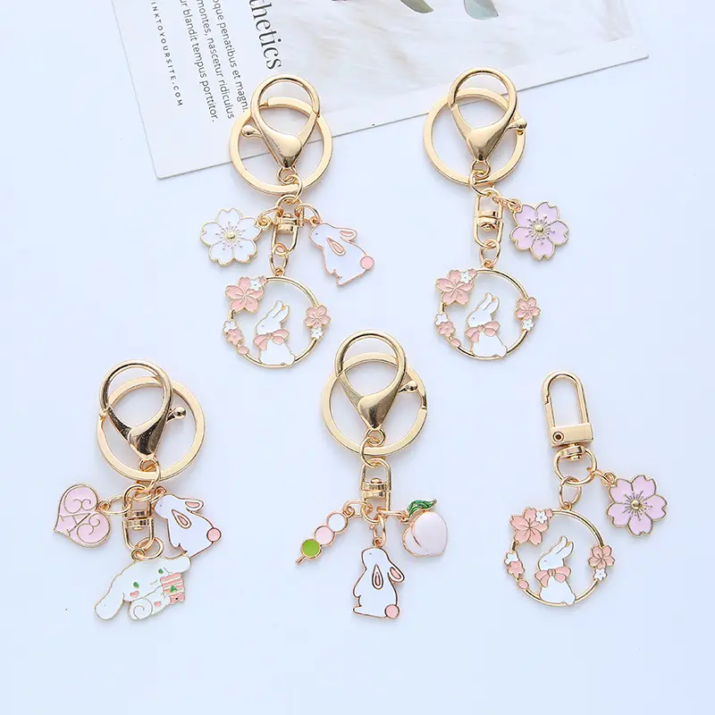 Yeni Trendy sevimli tavşan anahtarlık sakura Charms Metal emaye anahtar zincirleri kadınlar için kulaklık koruyucu kılıf anahtarlık çanta dekor