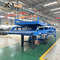 Rampe de quai hydraulique mobile CE pour usine, plateforme de chargement robuste, équipement de manutention de marchandises pour chariots élévateurs et logistique d'entrepôt