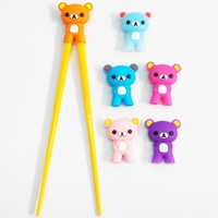 Couvre-bâtonnets en silicone motif ours de dessin animé, design moderne et minimaliste pour l'apprentissage de la posture de prise des bâtonnets par les enfants