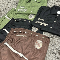 Ensemble survêtement homme coupe-vent en polyester et nylon avec polo boutonné et short personnalisé