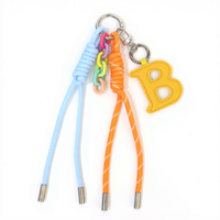 Nouveau porte-clés et pendentif de sac en cuir PU tendance à faire soi-même, avec lettres anglaises A-Z, modèle QM pour femme de bureau