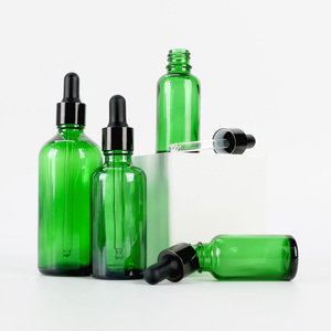 Flacon d'huile essentielle avec logo personnalisé, flacon compte-gouttes en verre vert pour huile d'aromathérapie, contenant cosmétique vide avec compte-gouttes en caoutchouc - Product Image 4