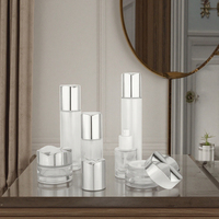 Ensemble de flacons en verre cylindriques de luxe 35ml/100ml/120ml avec bouchon pompe pulvérisateur, crème, lotion, diffuseur, impression sur écran, emballage, pots de 30g