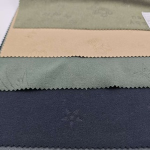 Thiết kế mới 100% polyester <span class=keywords><strong>dty</strong></span> Spandex dralon đan một bên chải vải với Emboss cho hàng may mặc - Product Image 1