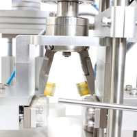 Machine de distribution de petites bouteilles de parfum d'huile essentielle de jus de pompe à piston de haute technologie