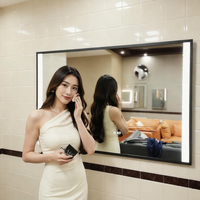 Miroir de salle de bain intelligent à LED avec éclairage tactile Bluetooth, anti-buée, moderne, mural, avec cadre noir