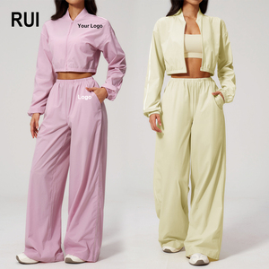 Ensemble de yoga RUIQUWIN pour femmes grandes tailles, sensation de fraîcheur, respirant, séchage rapide, tenue de sport deux pièces rayée et ample - Product Image 1