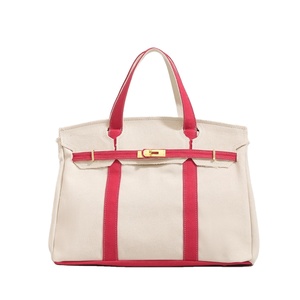 Grand sac fourre-tout vintage en toile pour femme, motif rayures contrastées, avec boucle dorée et rabat, idéal pour les voyages et les affaires - Product Image 1