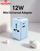 Adaptateur de voyage universel FOXCAN Mini (USB-C/USB-A) PD 12W, chargeur mural tout-en-un pour les États-Unis/UE/Royaume-Uni/Australie (noir)