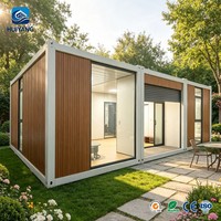 Maison conteneur modulaire de luxe extensible, petite maison préfabriquée pliable pour l'extérieur, portique en verre pliable en conteneur