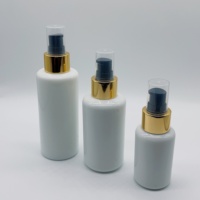 Flacon de lotion en verre de haute qualité pour cosmétiques, 50 ml, 100 ml, 120 ml, flacon rond en verre blanc avec pompe à lotion dorée