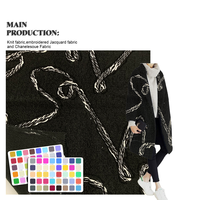 Proveedor de China GRS, material de ropa tejido 100% poliéster Tweed marca invierno tela de rizo francés para abrigo suéter ropa