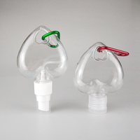 Flacon pulvérisateur PETG 50 ml personnalisé en usine avec porte-clés, flacon cœur pour lotion, conteneur liquide pour soins personnels, emballage