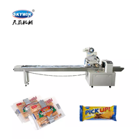 Machine d'emballage automatique Skywin modèle SK-380S pour biscuits, gâteaux et snacks, avec deux voies d'alimentation vibratoires pour usine