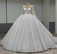 Robe de mariée de luxe 2026 entièrement ornée de cristaux, style robe de bal, manches longues transparentes, col rond illusion, grande taille, style africain, Vestido De Novia