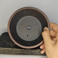 Vente flash : Pot à bonsaï rond de style antique avec design lignes et pieds nuage