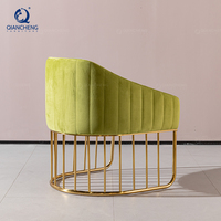 QIANCHENG vert salon meubles chaises moderne italie design moderne en métal attente velours bouffées fauteuil