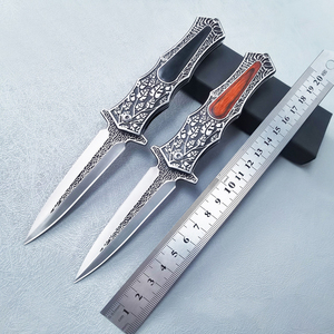 Cuchillo de caza de acero inoxidable con punta curva, mango de madera y diseño de hoja grabada para uso en exteriores - Product Image 6