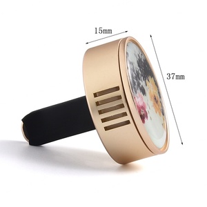 Difusor de Aromaterapia para Auto, con Clip para Rejilla de Ventilación, Diseño Circular de Lujo, con Adhesivo Epóxico y Imán Metálico Plateado - Product Image 2