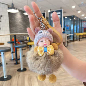 Vente en gros de poupées bébé mignonnes et kawaii, livraison directe, poupée bébé endormie, porte-clés pour femmes, breloque de sac, porte-clés en peluche pompon - Product Image 6