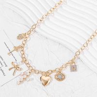 Collier pour femme en alliage de bambou, style vintage audacieux, avec pendentif croix, nœud et perles d'imitation, serti de diamants