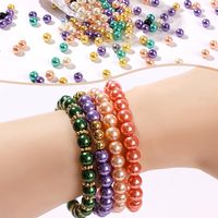 Lot de 750 perles en résine plastique colorées imitation perle à trou droit, 24 compartiments, pour matériaux de perlage DIY et accessoires de bijoux, en coffret