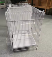 Cage multifonctionnelle pour grand perroquet et oiseau fantaisie Matériau en fer fin transparent Type de palette Plateau en plastique Boîte d'emballage