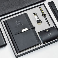 Ensemble cadeau exécutif personnalisé avec logo, carnet en cuir noir de luxe, stylo, porte-clés, porte-cartes de visite
