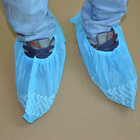 Protège-chaussures jetables non tissés antidérapants anti-poussière à motif roue pour laboratoire, visites à domicile, vente en gros, OEM