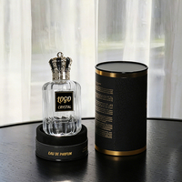 Botol Parfum Semprot Kosong Bulat Mewah Bertekstur Hitam Emas dengan Tutup Mahkota, Logo Kustom, 30ml 100ml, dengan Kotak Kemasan