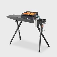 Table de barbecue pliable moderne haut de gamme en fer pour extérieur avec support de plaque chauffante et deux roues – Offre Spéciale