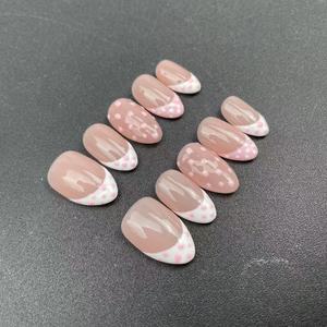 Las uñas cortas de almendra hechas a mano de alta calidad, borde de estilo francés blanco, se pueden reutilizar, venta al por mayor de fábrica - Product Image 4