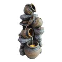 La dernière fontaine cascade de seau de robinet d'eau de mur de brique de résine avec quatre couches d'eau courante pour la décoration de patio de jardin