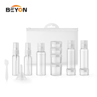 BSCI WCA ISO9001 13 en 1 ensemble de voyage de pot de bouteille en plastique avec le pulvérisateur lisse de 26ml 34ml bouchon de disque de 53ml 40ml pot de 5ml 10ml 15ml 20ml