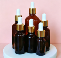 Flacon compte-gouttes en verre ambré avec collier doré et bulbe en caoutchouc blanc, flacon vide pour huile essentielle, sérum, emballage cosmétique