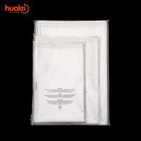 Kustom plastik plastik kemasan Polybag tas poli bening dengan peringatan kekurangan untuk kemasan pakaian T shirt