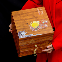 Un coffret cadeau de thé haut de gamme contenant du thé Pu'er, du thé Oolong et du thé noir, adapté pour offrir en cadeau ou pour un plaisir personnel.