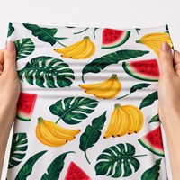 Tissu jersey léger en coton 95% et élasthanne 5% avec imprimé fruits aquarelle