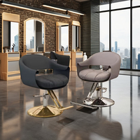 Chaise de salon en cuir gris classique moderne coupe de cheveux meubles de salon de coiffure avec des caractéristiques de style pour une utilisation au spa