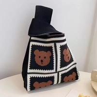 Sac fourre-tout portable au crochet pour femmes avec fleur mignonne sac à main tricoté en gros personnalisable sacs-cadeaux de remerciement