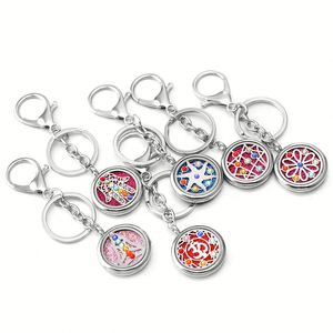 Pendentif de mode en acier inoxydable incrusté de zircon en forme de paume, diffuseur d'huiles essentielles et de parfum, petite boîte porte-clés - Product Image 1
