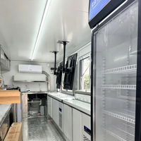 Remorque alimentaire personnalisée avec double porte de placard, évier et plan de travail extra long en composite, idéale pour la location dans les parcs et lors d'événements